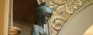 Bronze statue of woman with Roman-style helmet within the Wyoming State Capitol